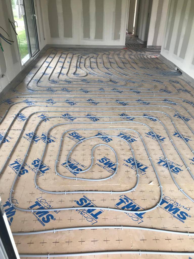 Réaliser un plancher chauffant dans une maison neuve à Sanguinet