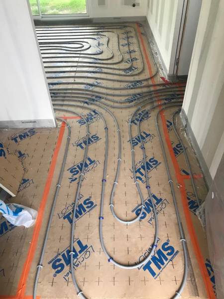 Réalisation d'un plancher chauffant dans une maison neuve à Sanguinet