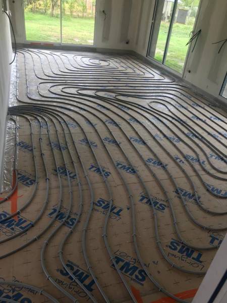 Pourquoi installer un plancher chauffant dans une maison neuve à Sanguinet pour un confort optimal