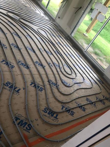 Plancher chauffant dans une maison neuve à Sanguinet